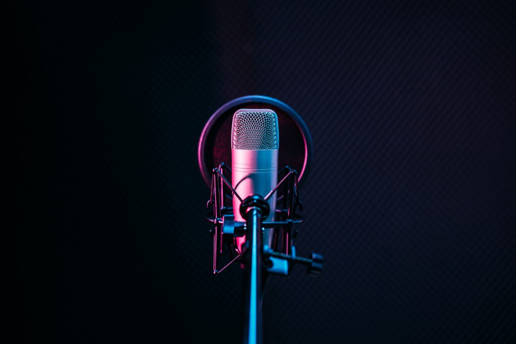 A dramatic image of a microphone