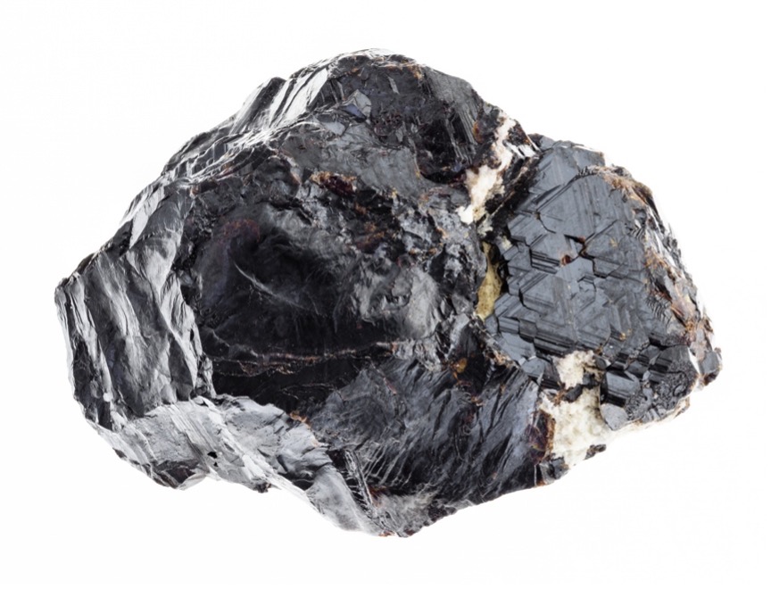 A black rock with white veins